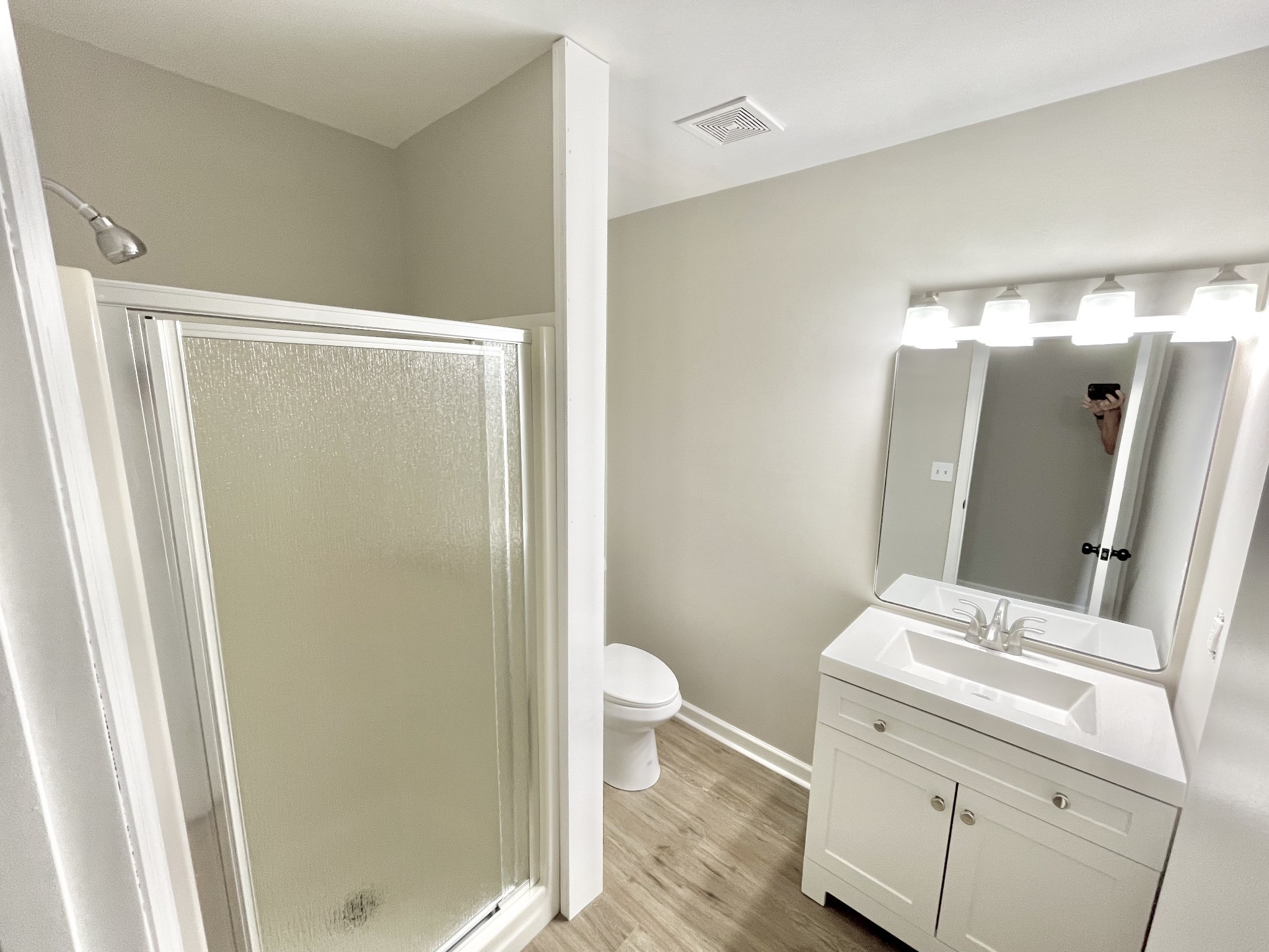 3460 Bradyville Road Readyville, TN 37149 - Photo 17 of 42 a bathroom with a sink and mirror with toilet