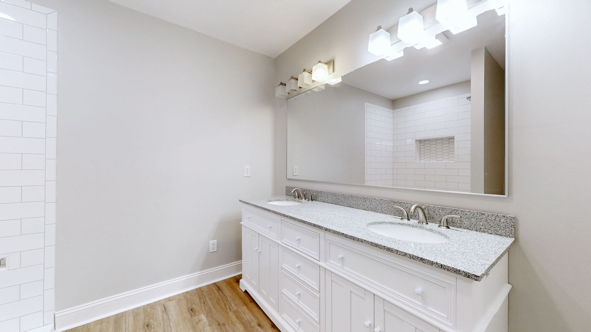3460 Bradyville Road Readyville, TN 37149 - Photo 20 of 42 a bathroom with a sink vanity granite and a mirror