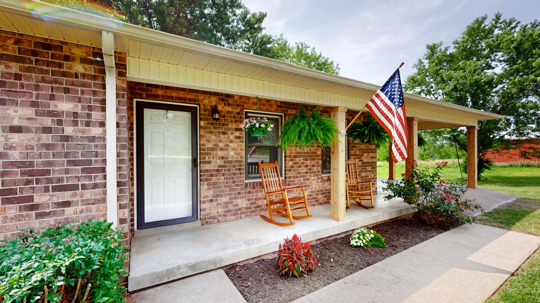 3460 Bradyville Road Readyville, TN 37149 - Photo 2 of 42 front view of a house with a porch