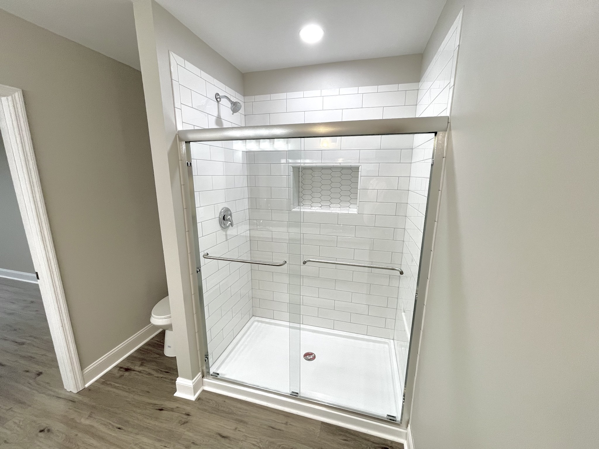 3460 Bradyville Road Readyville, TN 37149 - Photo 21 of 42 a bathroom with a glass shower door