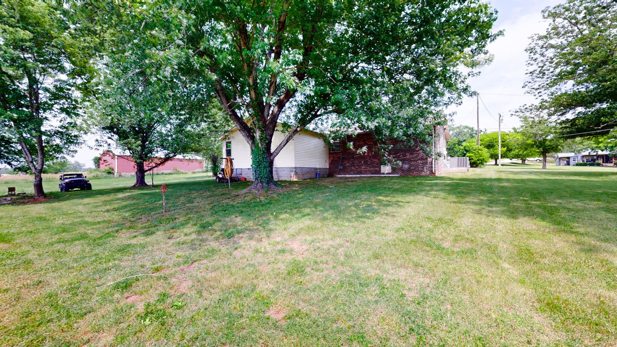 3460 Bradyville Road Readyville, TN 37149 - Photo 3 of 42 a view of a trees in front of a house