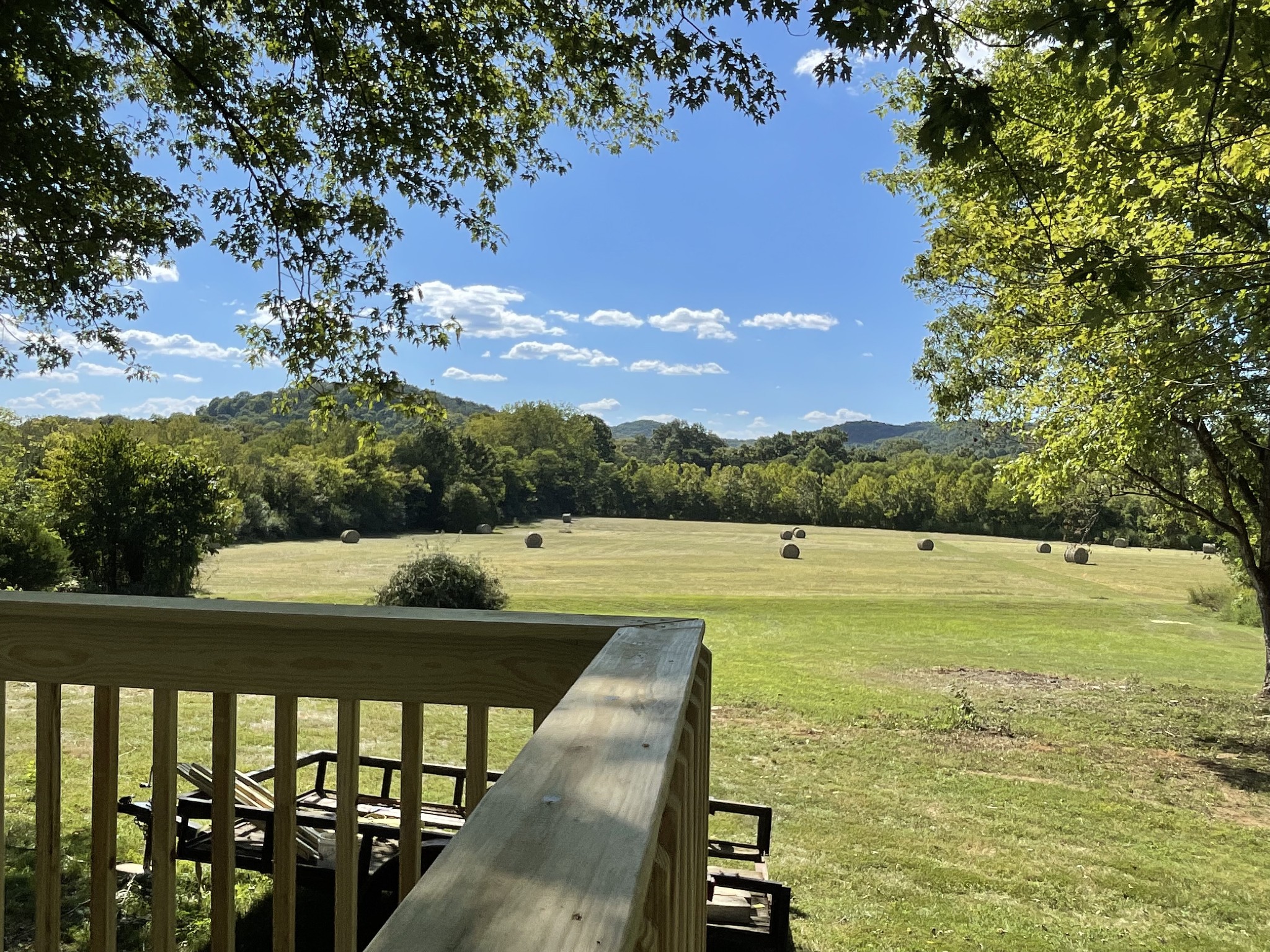 3460 Bradyville Road Readyville, TN 37149 - Photo 39 of 42 a view of swimming pool with seating area and trees in the background