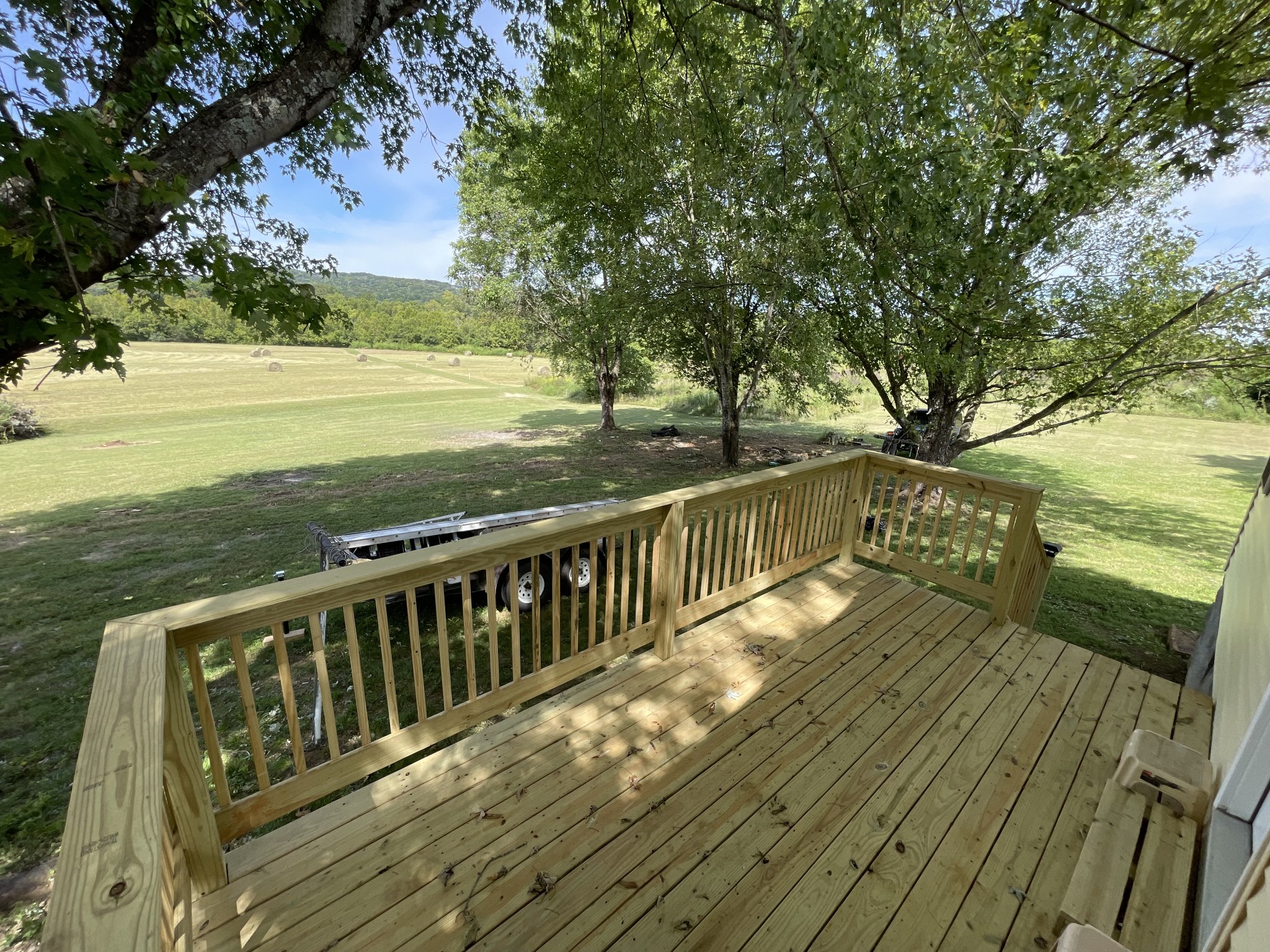 3460 Bradyville Road Readyville, TN 37149 - Photo 40 of 42 a view of a balcony with wooden floor and with trees