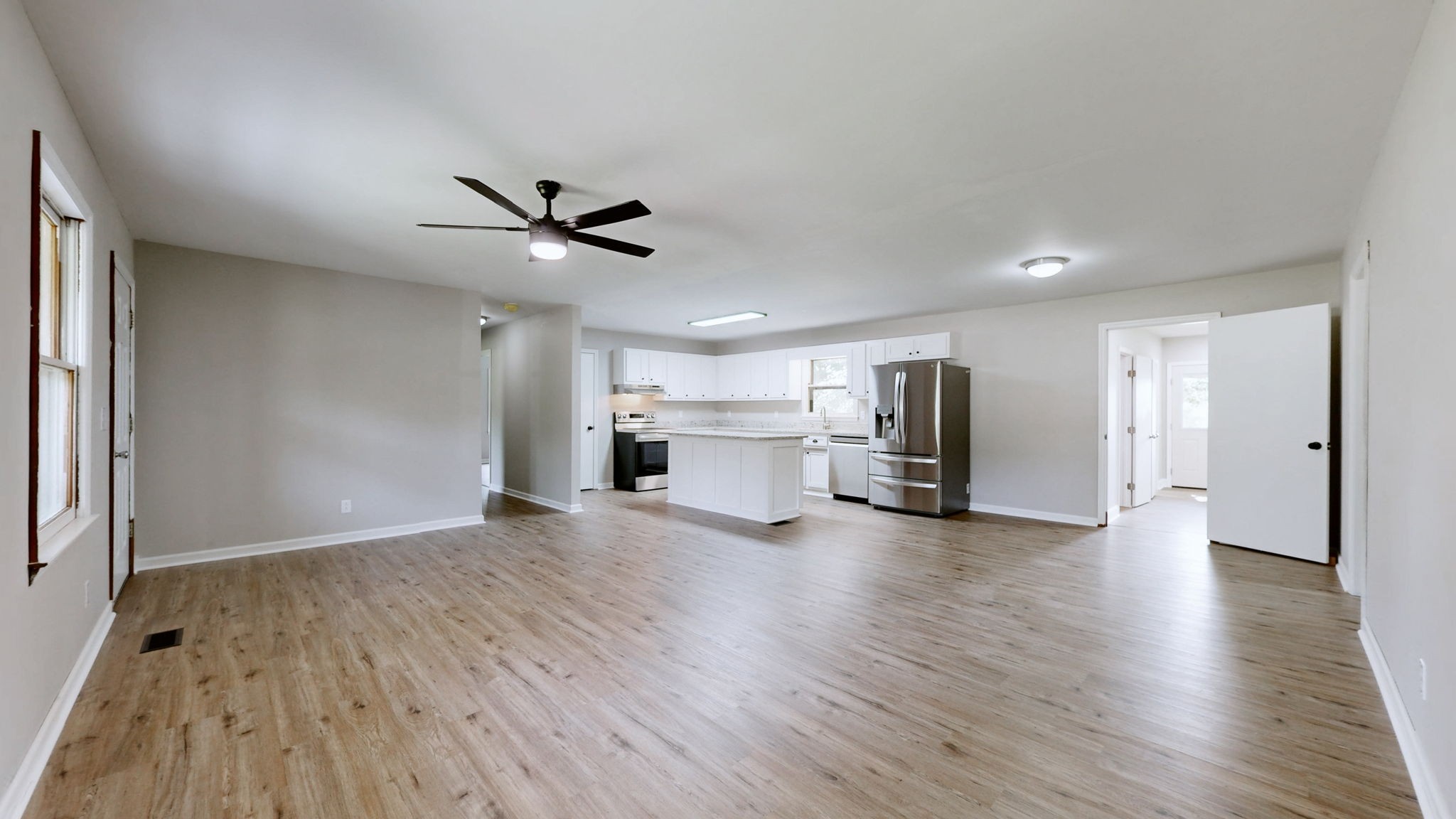 3460 Bradyville Road Readyville, TN 37149 - Photo 6 of 42 a view of a kitchen with a sink and a refrigerator