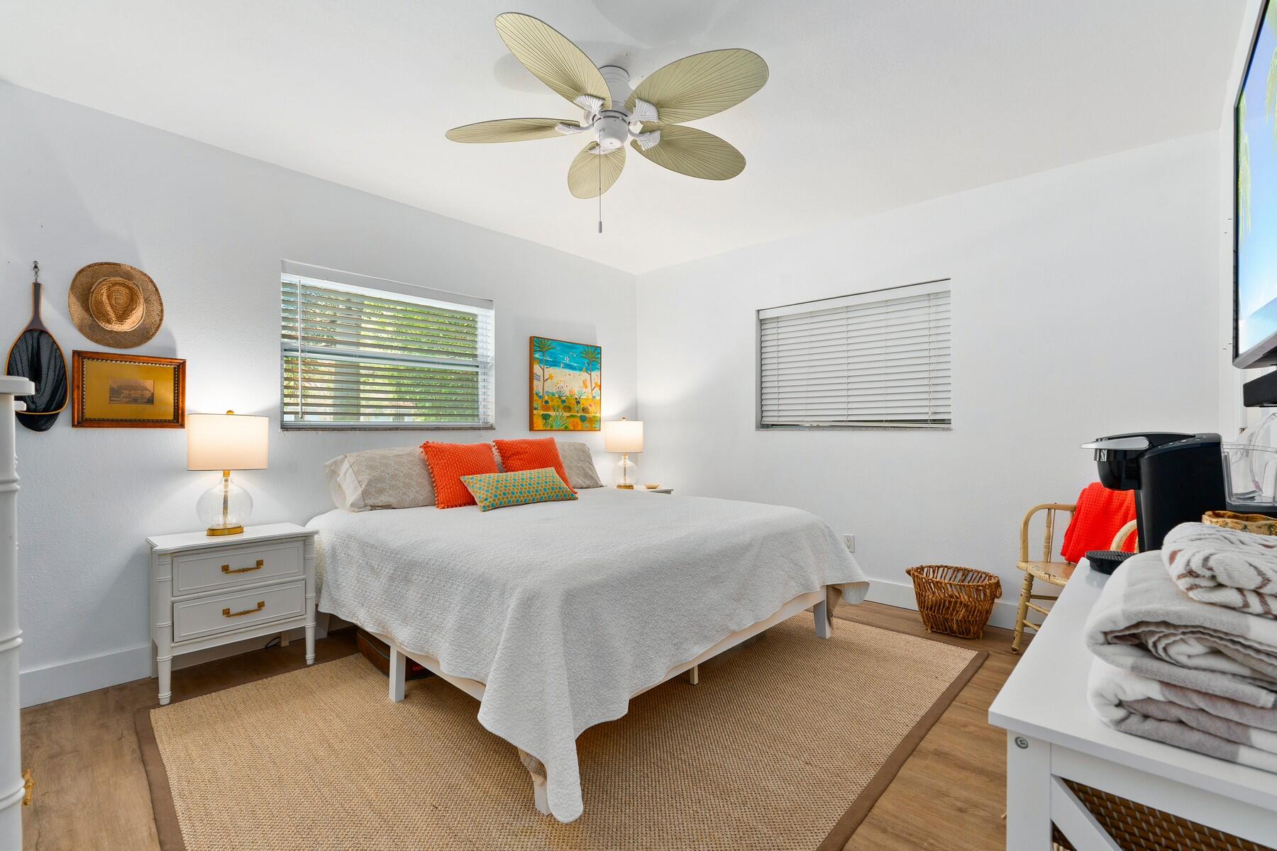 609 South 9th Street Fort Pierce, FL 34950 - Photo 13 of 39 a bedroom with a bed and a chandelier