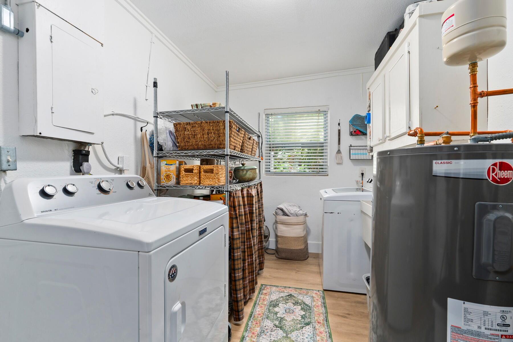 609 South 9th Street Fort Pierce, FL 34950 - Photo 19 of 39 a utility room with dryer and washer