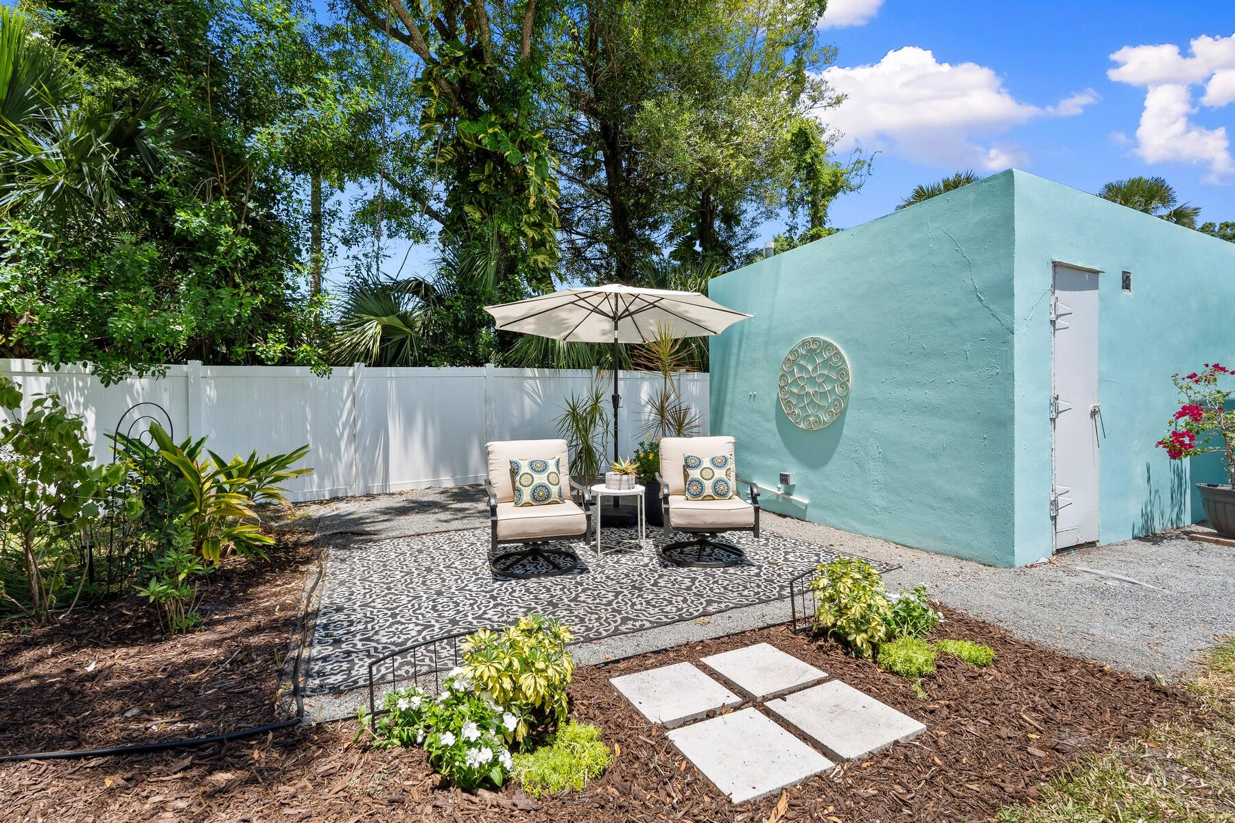 609 South 9th Street Fort Pierce, FL 34950 - Photo 26 of 39 a view of a patio with furniture and a garden