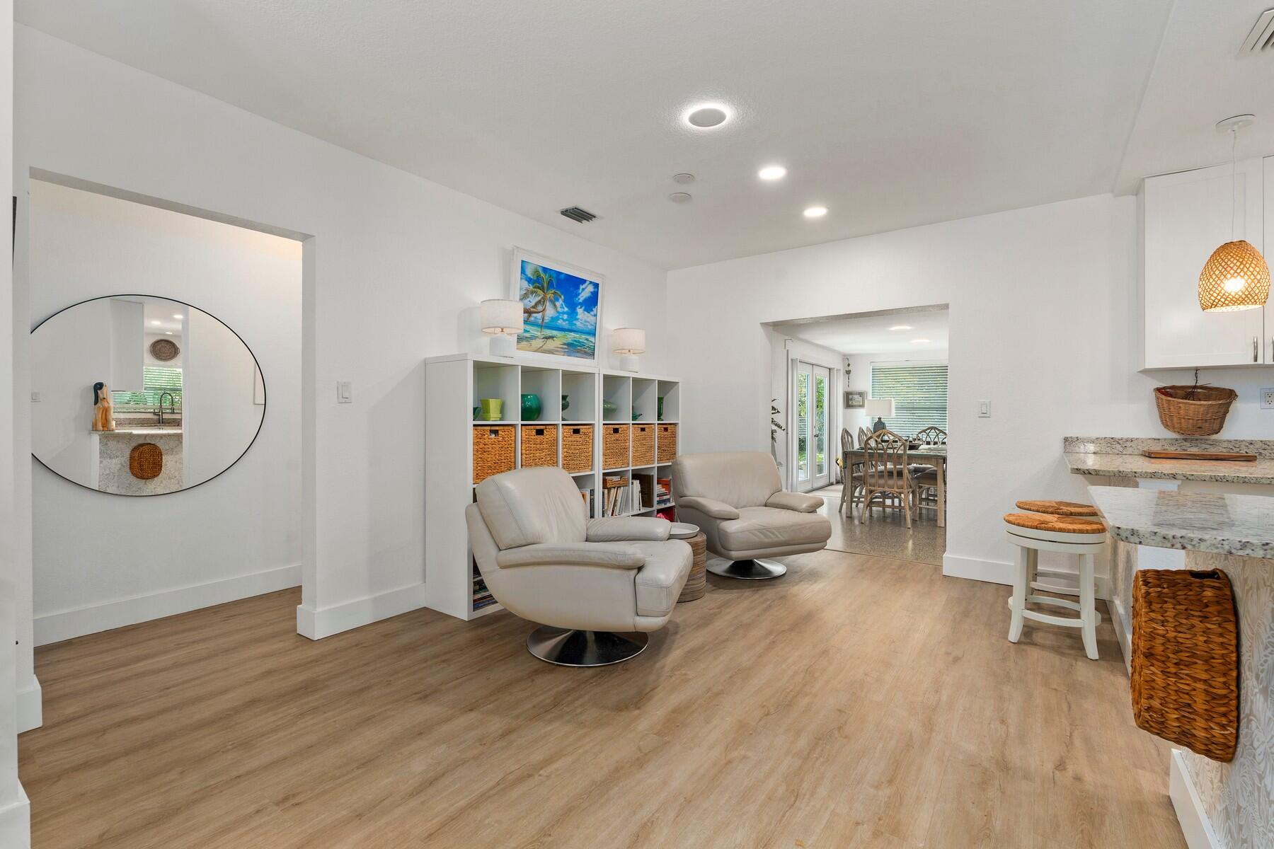 609 South 9th Street Fort Pierce, FL 34950 - Photo 8 of 39 a living room with furniture and a wooden floor