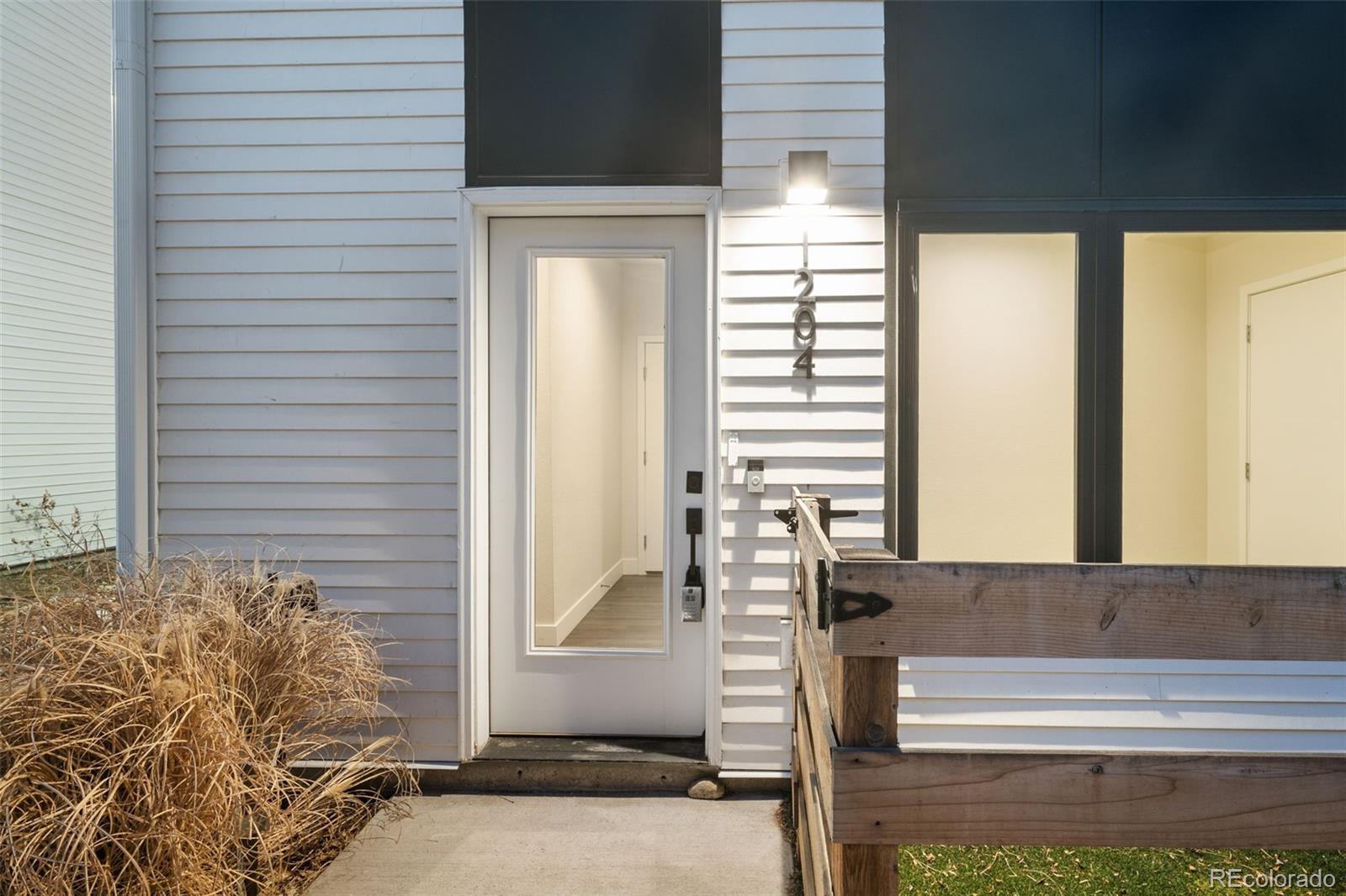 1204 South Reed Street Lakewood, CO 80232 - Photo 26 of 45 a view of entrance door of the house