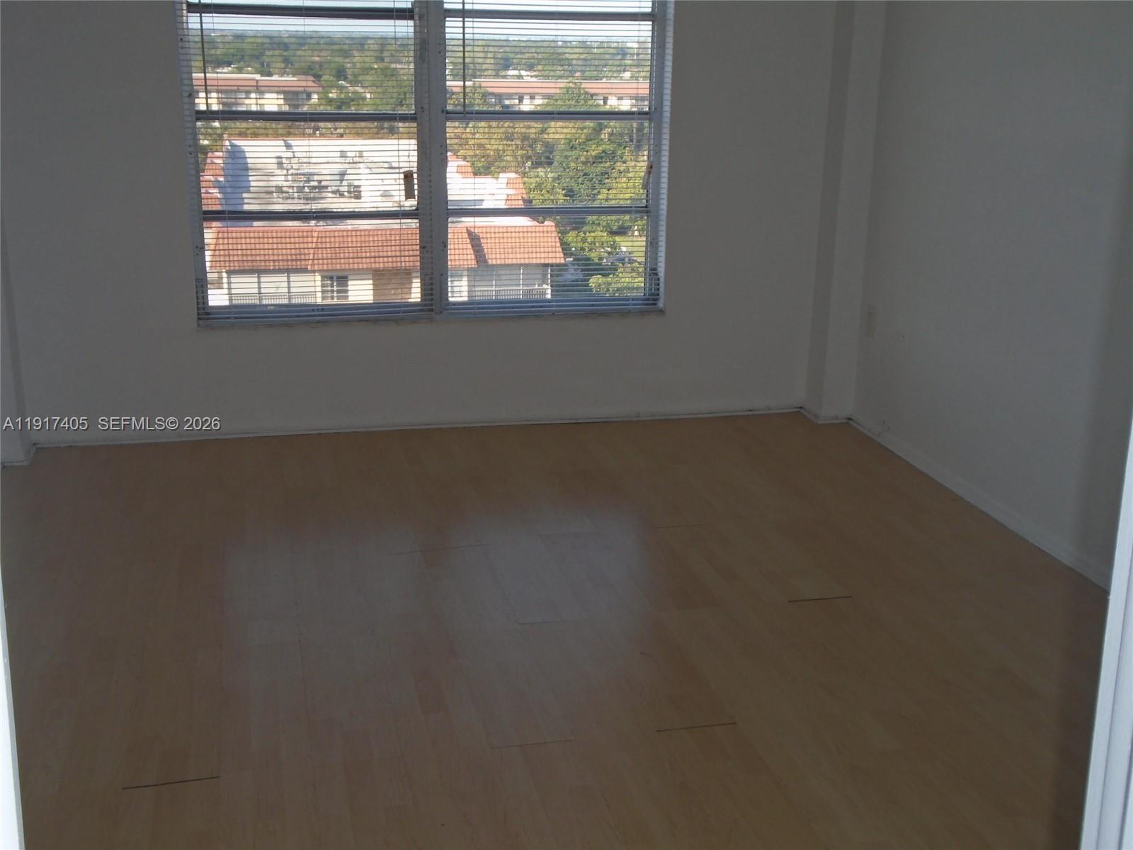 4174 Inverrary Drive, Unit 1003 Lauderhill, FL 33319 - Photo 8 of 30 a view of a room that has a window in it