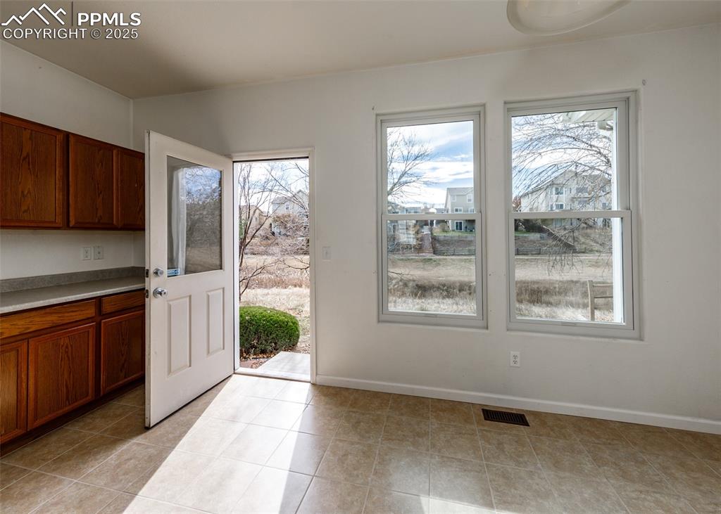 7818 Sandy Springs Point Fountain, CO 80817 - Photo 15 of 46 a kitchen with a window and a sink