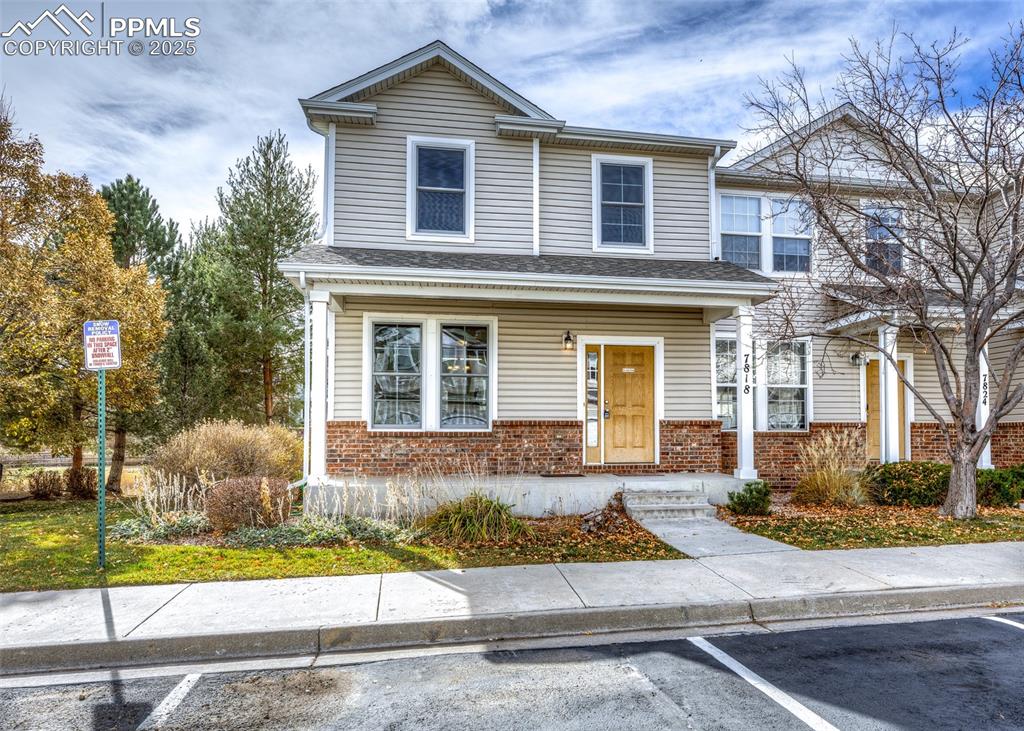 7818 Sandy Springs Point Fountain, CO 80817 - Photo 2 of 46 a front view of a house with a yard