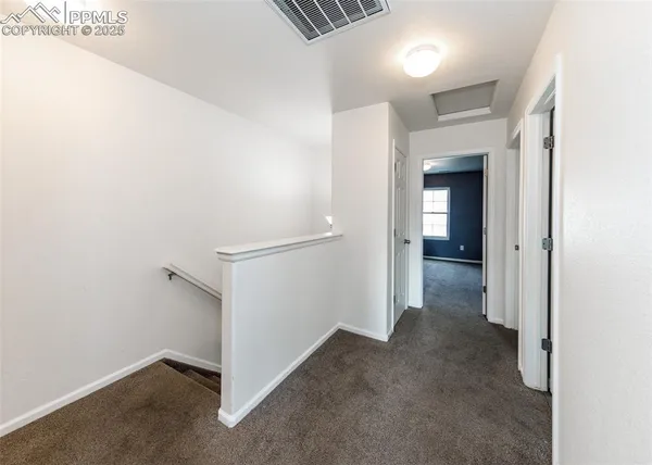 a view of a room with an empty space