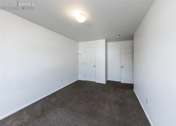 an empty room with an entryway