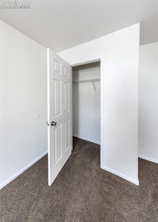 7818 Sandy Springs Point Fountain, CO 80817 - Photo 35 of 46 an empty room with windows