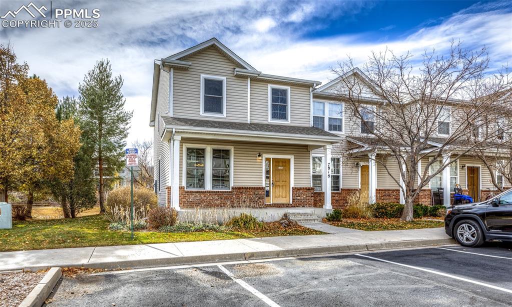 7818 Sandy Springs Point Fountain, CO 80817 - Photo 41 of 46 front view of a house with a yard