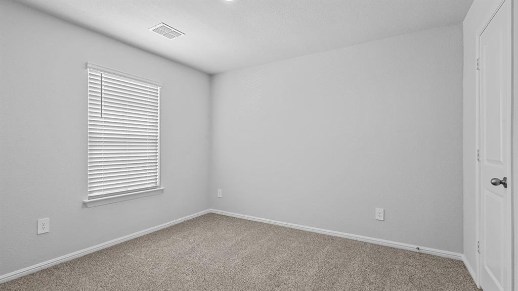 120 Mojave Road Boyd, TX 76023 - Photo 29 of 40 an empty room with a window