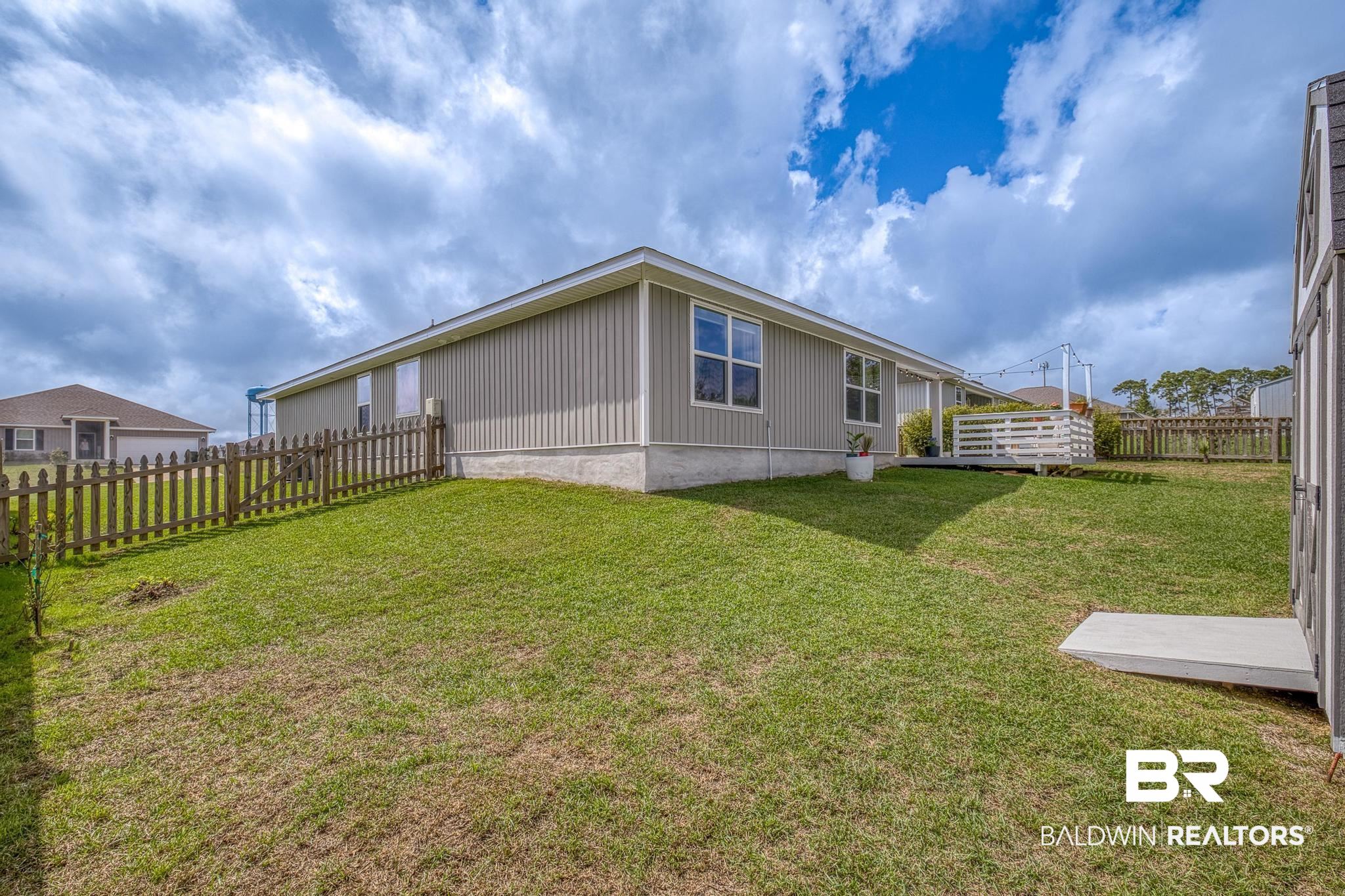 3078 Camino Real Loop Lillian, AL 36549 - Photo 25 of 51 View of fenced backyard
