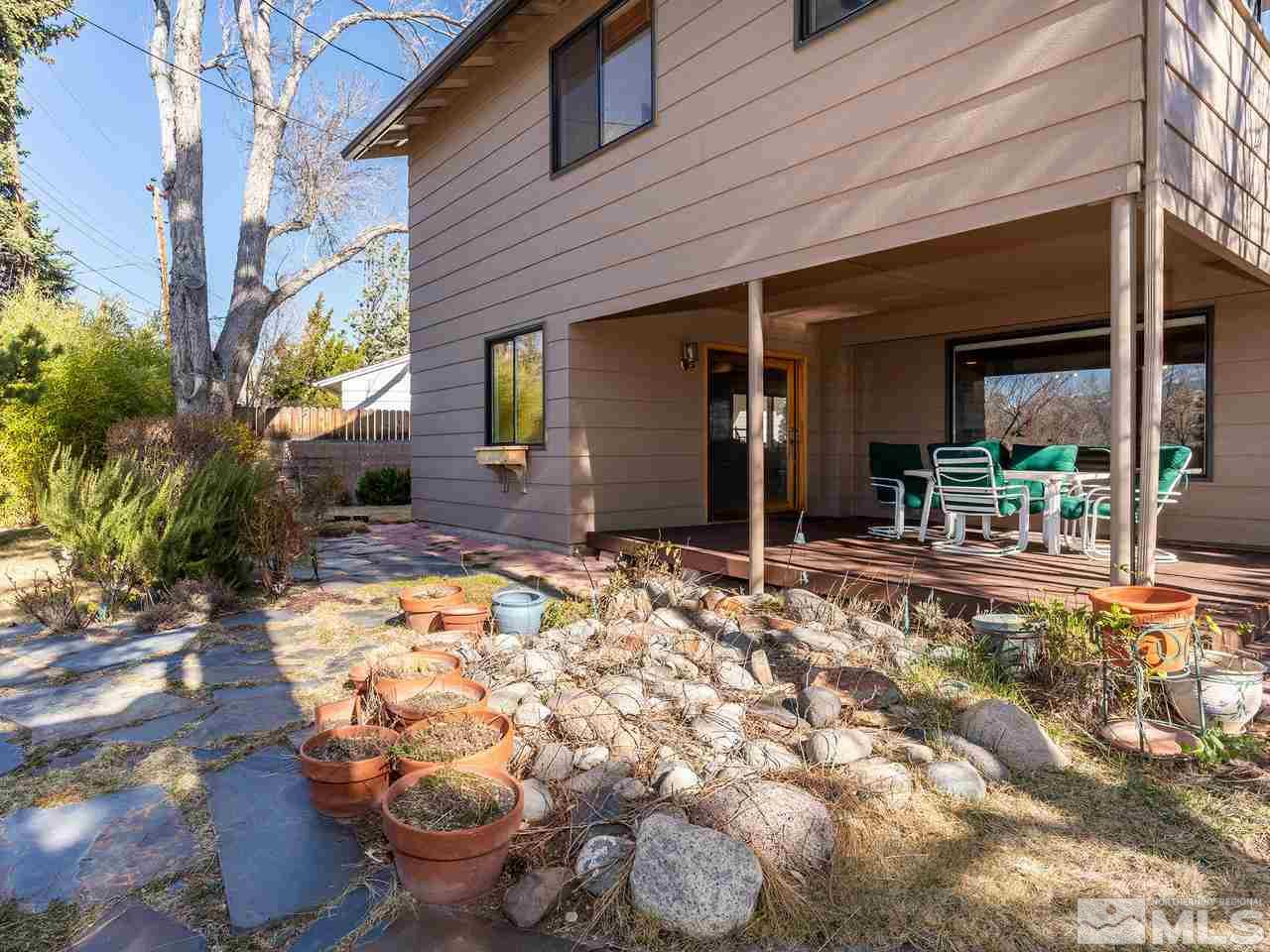 2490 Sutter Circle Reno, NV 89503 - Photo 14 of 16 a view of a house with yard and sitting area