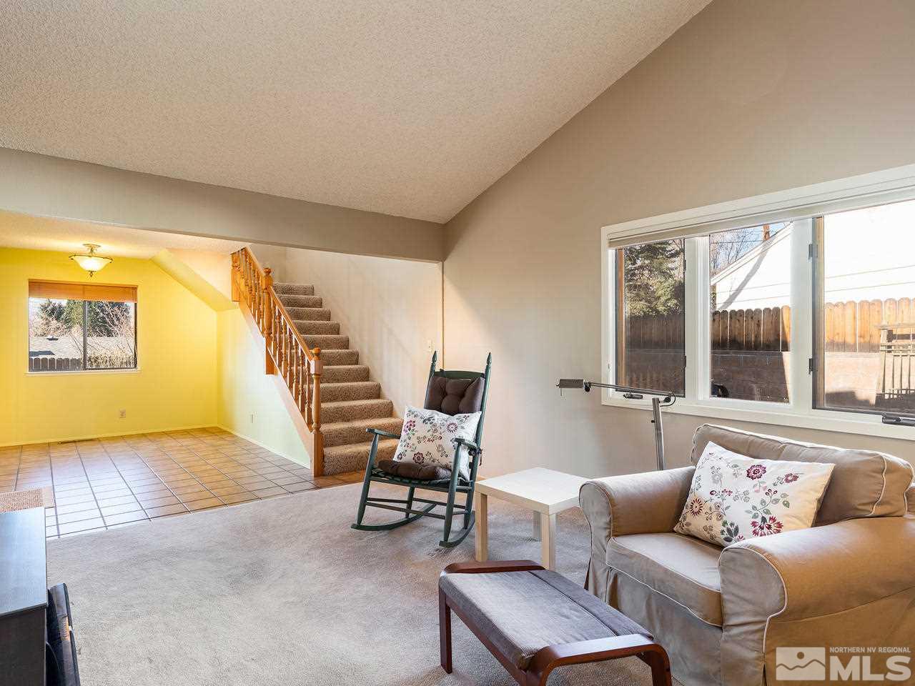 2490 Sutter Circle Reno, NV 89503 - Photo 6 of 16 a living room with furniture and a large window