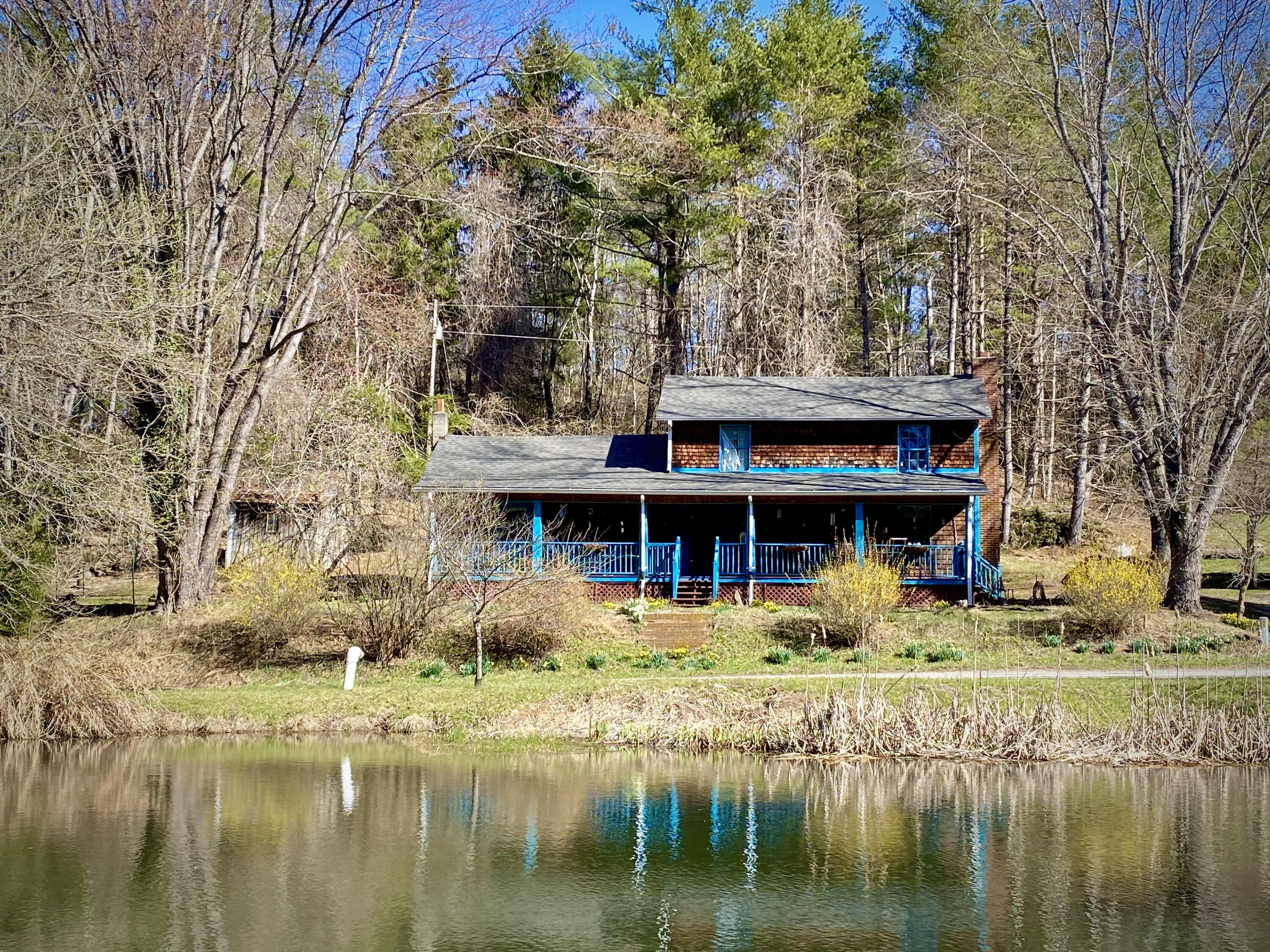 289 Huckleberry Ridge Road Northeast Floyd, VA 24091 - Photo 1 of 36 a view of house with yard