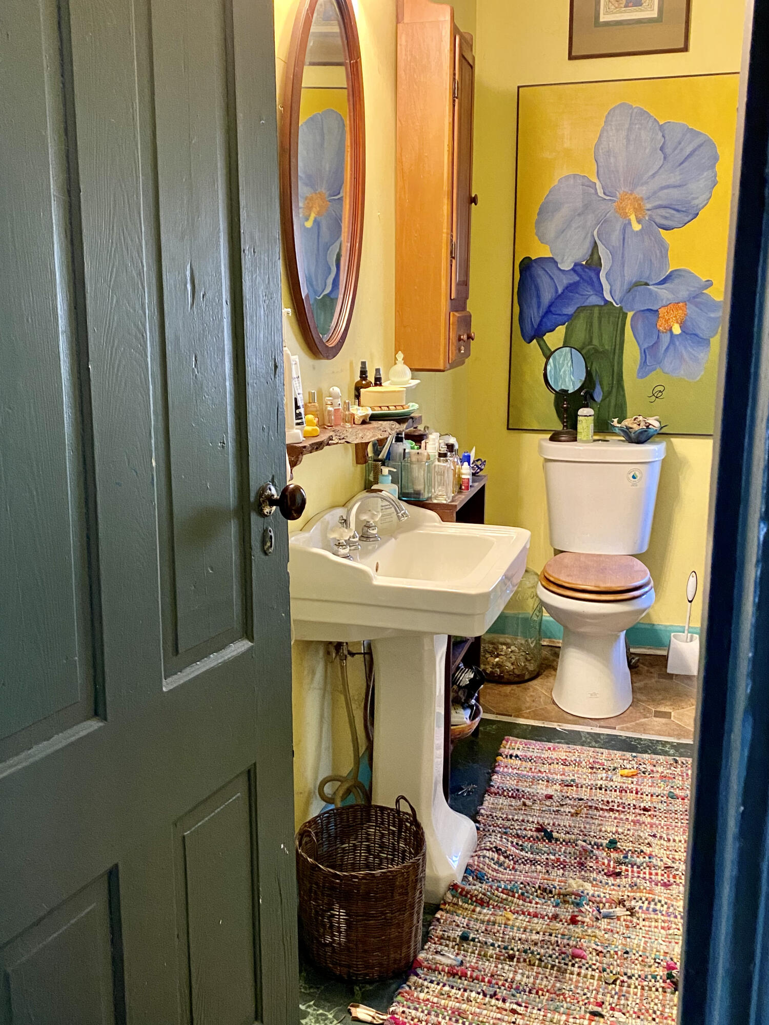 289 Huckleberry Ridge Road Northeast Floyd, VA 24091 - Photo 16 of 36 a bathroom with a sink toilet and mirror