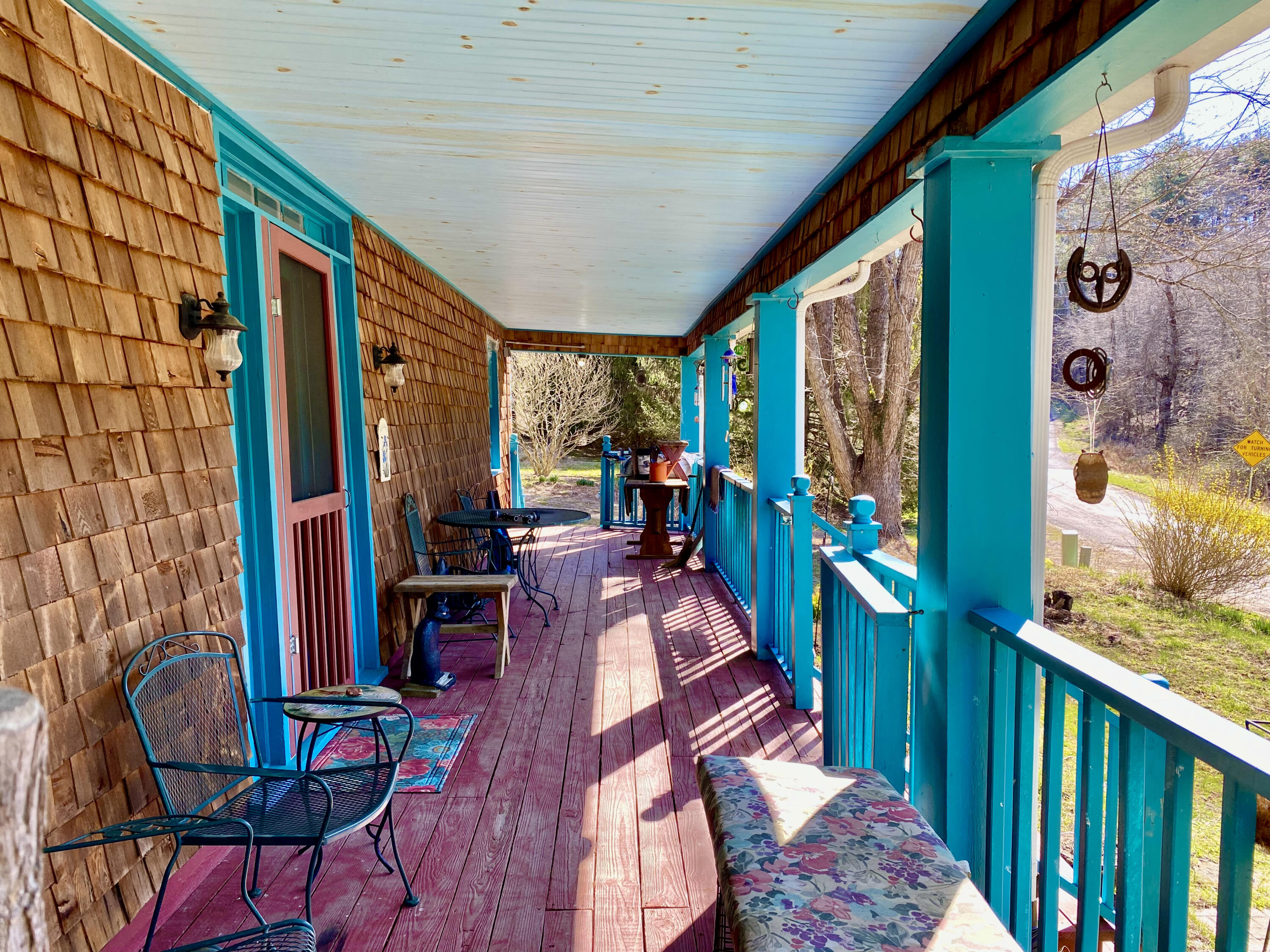 289 Huckleberry Ridge Road Northeast Floyd, VA 24091 - Photo 6 of 36 a view of a balcony with chairs