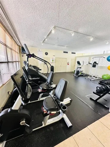 a view of a room with gym equipment