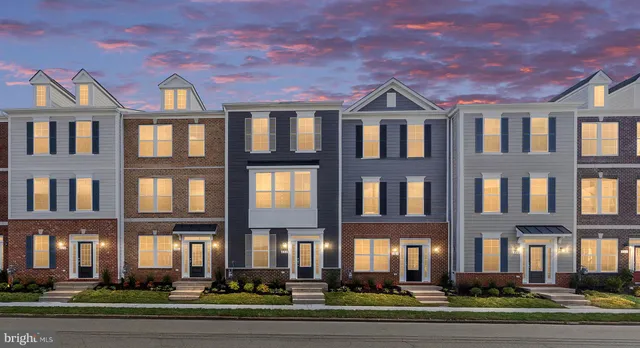a front view of residential houses