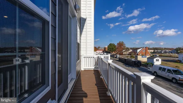 a view of a balcony with chairs
