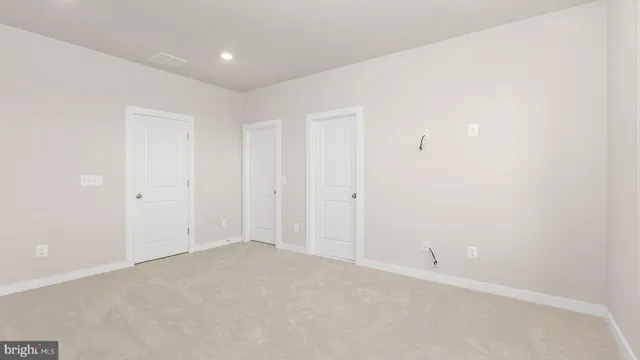 an empty room with an entryway