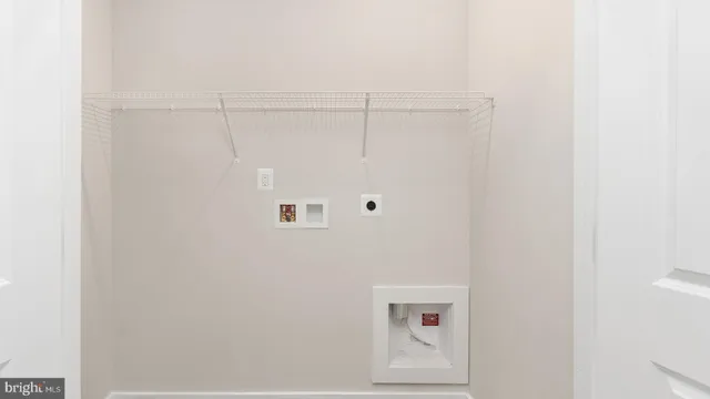 a front view of a brick house with many windows