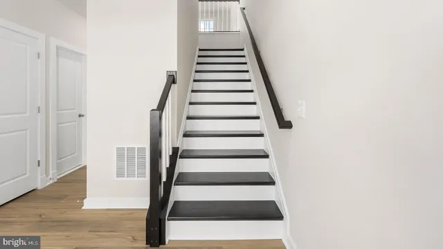 a view of entryway with wooden floor