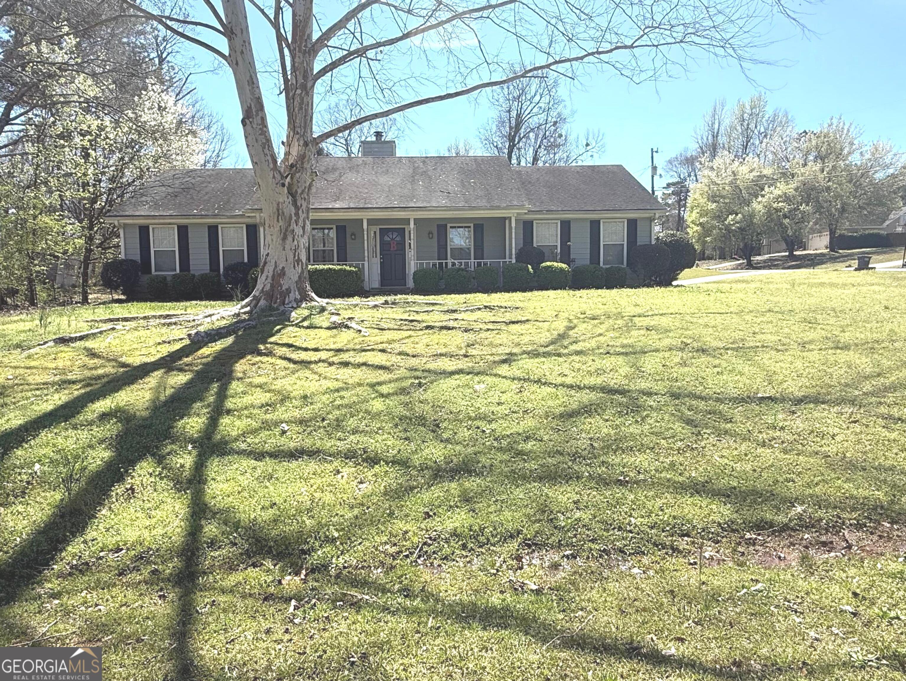 10 Oaklake Court Covington, GA 30016 - Photo 1 of 1 a view of a house with a yard