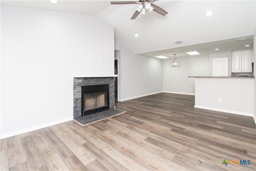 2610 San Jacinto Road Temple, TX 76502 - Photo 3 of 24 a view of an empty room with a fireplace