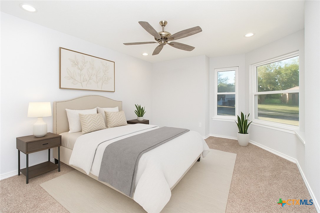 2610 San Jacinto Road Temple, TX 76502 - Photo 10 of 24 a bedroom with a bed and window