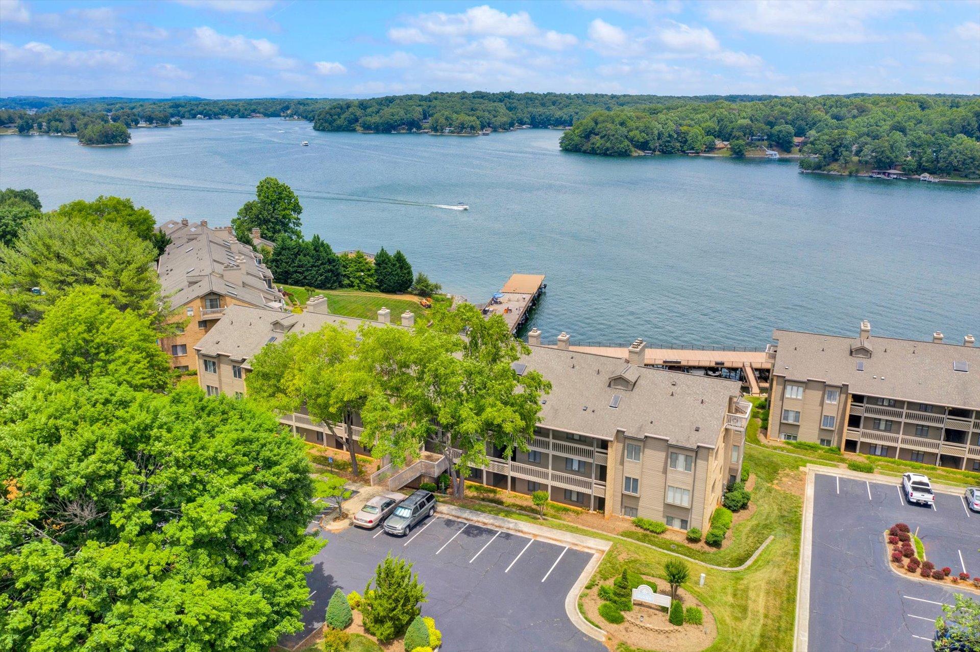 845 Gangplank Road, Unit 207 Moneta, VA 24121 - Photo 2 of 29 an aerial view of residential houses with outdoor space and lake view