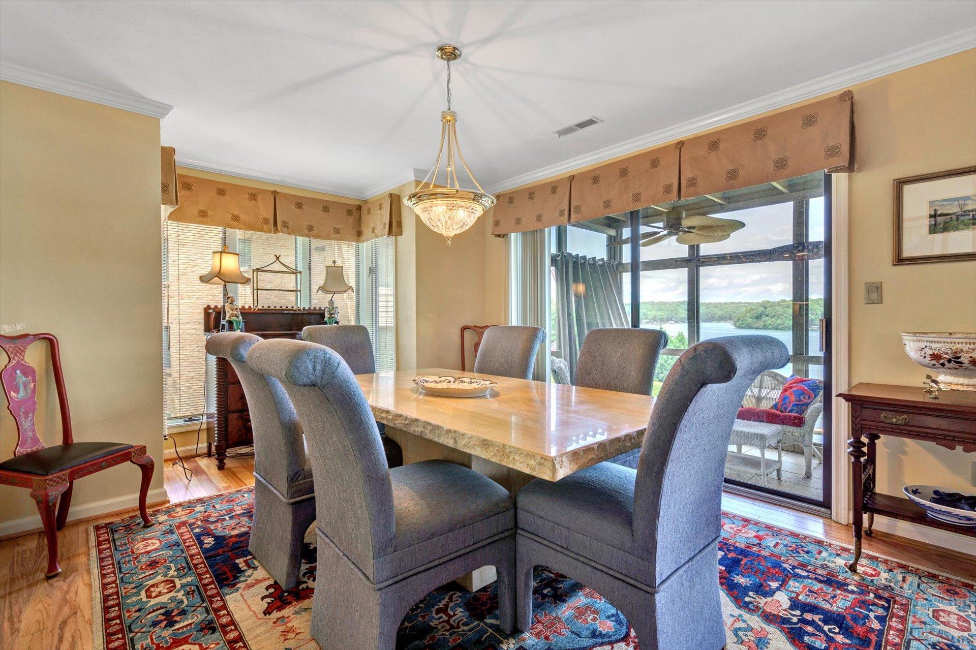 845 Gangplank Road, Unit 207 Moneta, VA 24121 - Photo 14 of 29 a view of a dining room with furniture window and wooden floor
