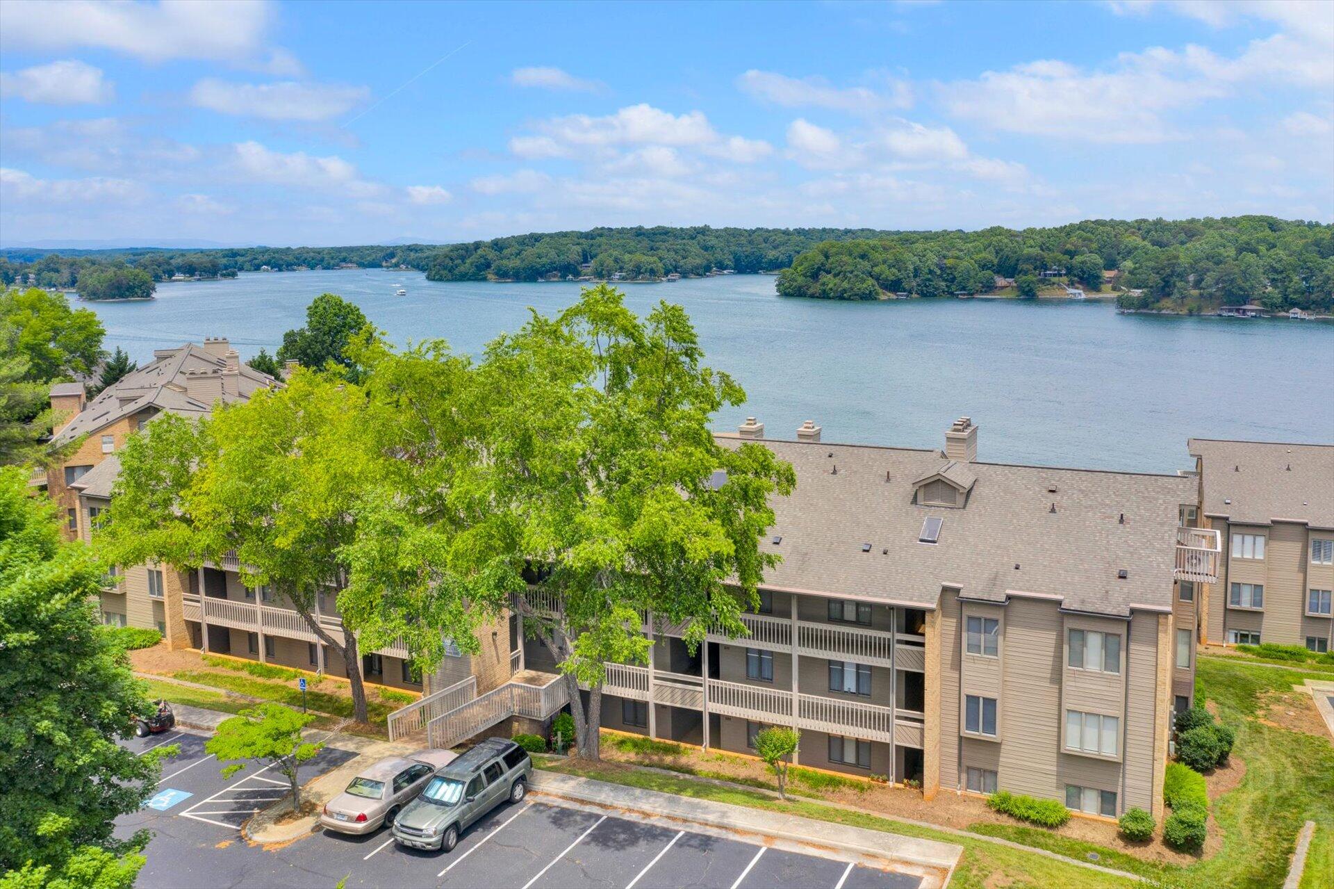 845 Gangplank Road, Unit 207 Moneta, VA 24121 - Photo 3 of 29 a view of a lake with houses
