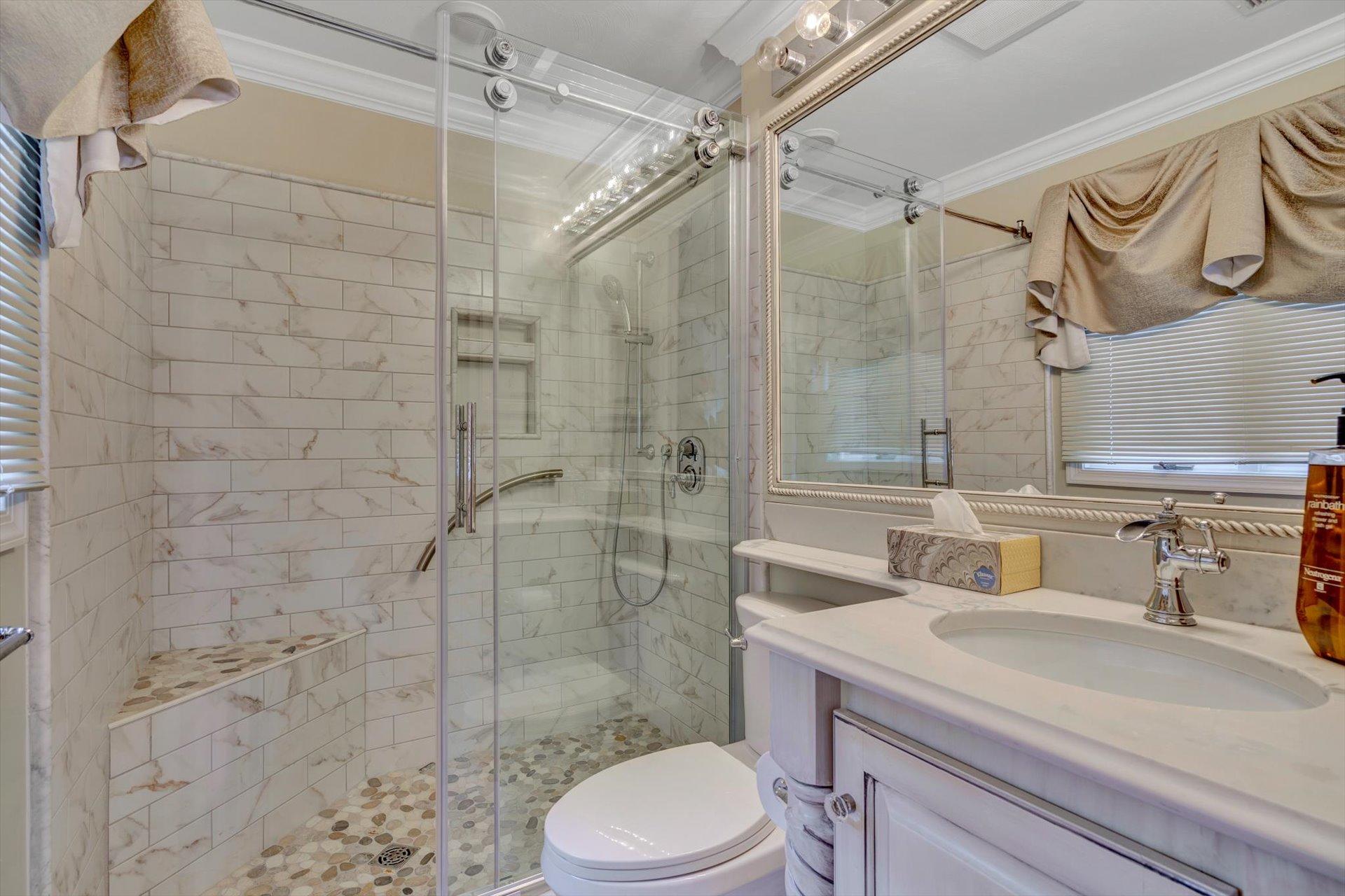 845 Gangplank Road, Unit 207 Moneta, VA 24121 - Photo 23 of 29 a bathroom with a sink toilet and shower