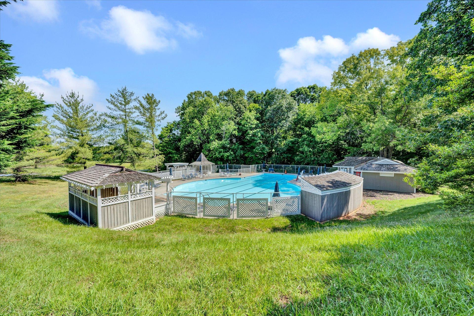845 Gangplank Road, Unit 207 Moneta, VA 24121 - Photo 26 of 29 a view of a dinning table and chair in the garden