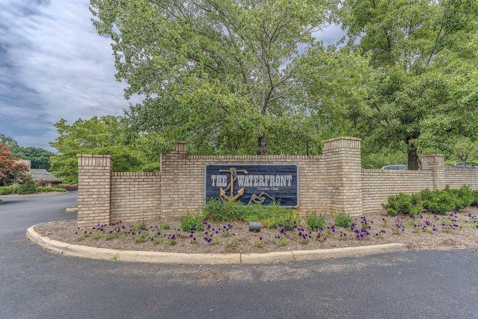 845 Gangplank Road, Unit 207 Moneta, VA 24121 - Photo 28 of 29 a sign on the side of a road
