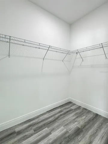 a view of a room with racks on the wall