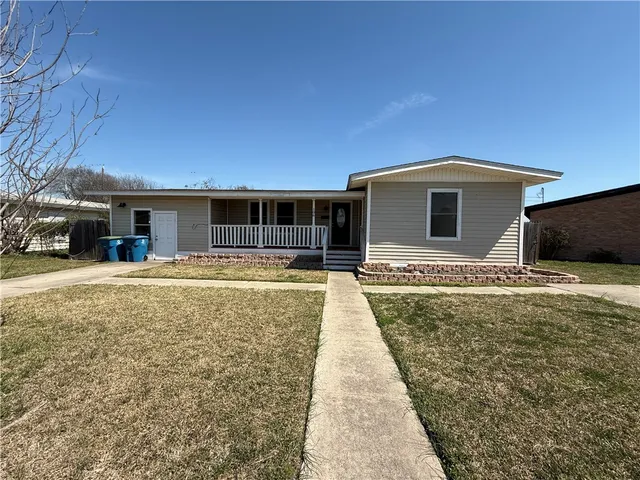 a view of house with outdoor space
