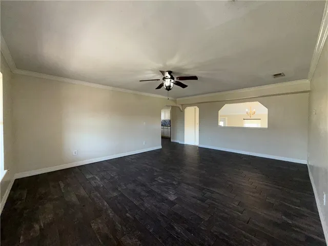 a storage room with a wooden floor