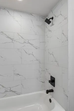 a bathroom with a bathtub