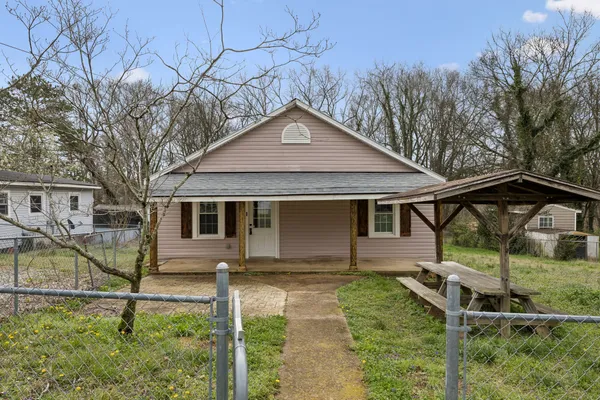 a house view with a garden space