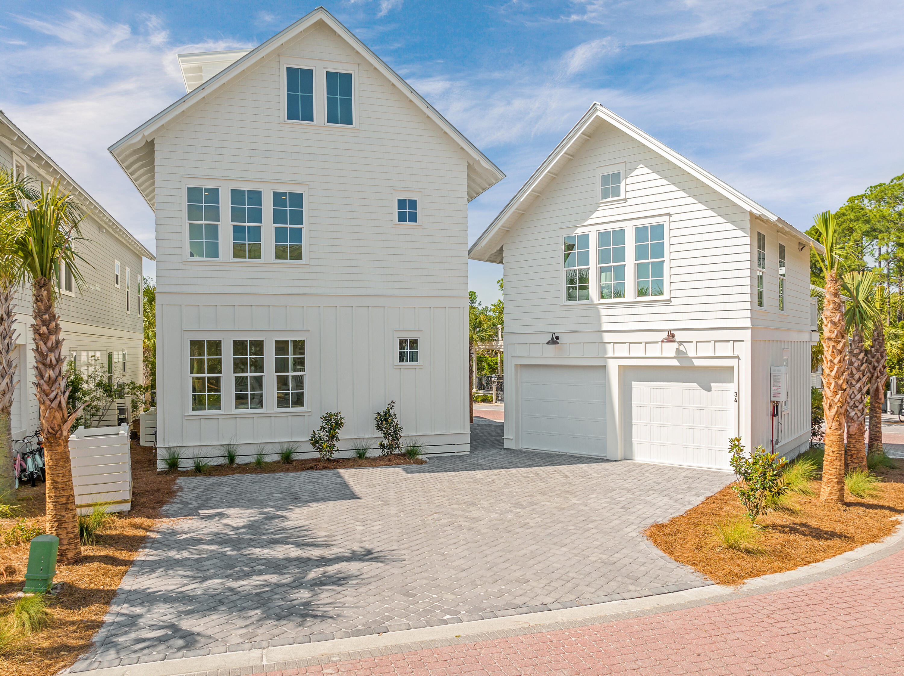 34 East Endless Summer Way Inlet Beach Inlet Beach, FL 32461 - Photo 54 of 72 a front view of a house with a yard and seating space