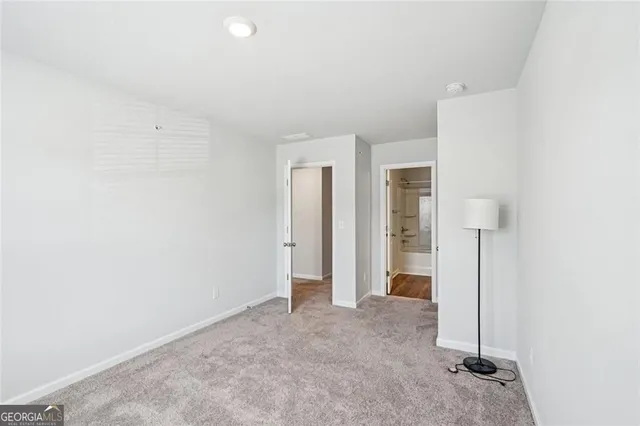 an empty room with a door