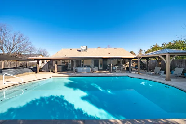a outdoor space with patio the couches and a potted plant
